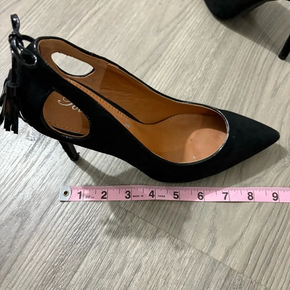 Toi Et Moi Pointed Toe Teardrop‎ Cutout Back Black Tassel Pump